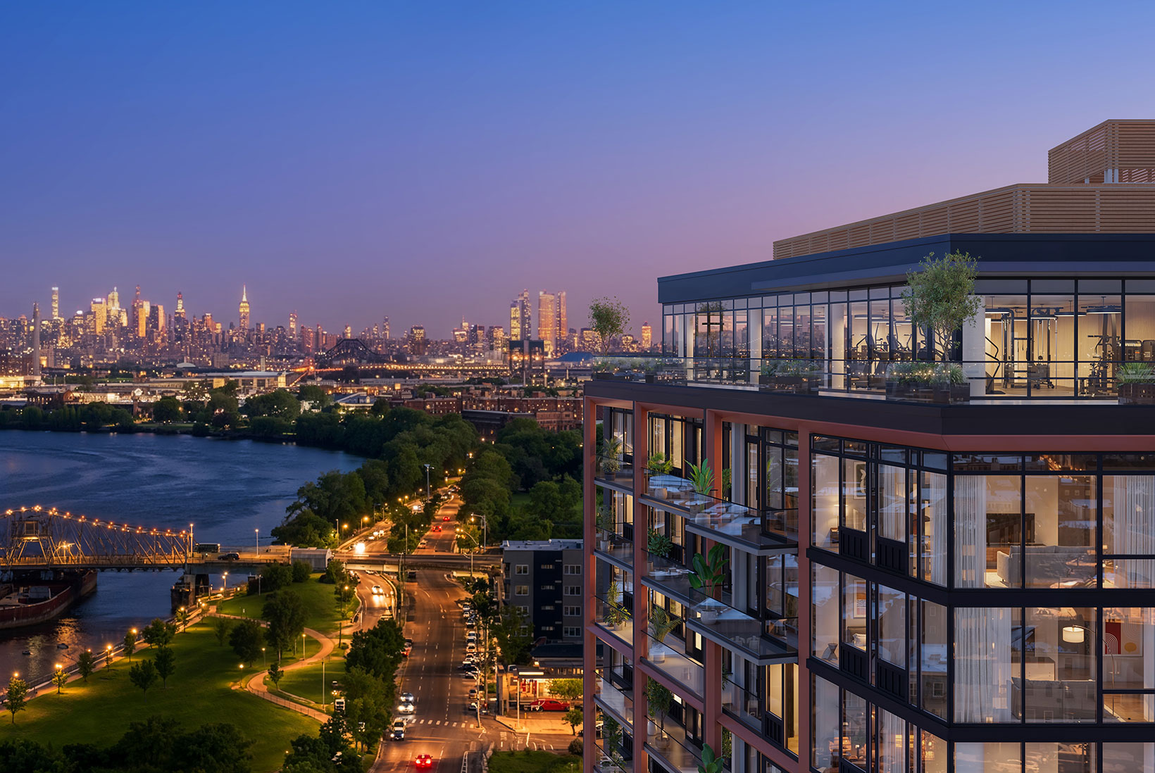 Aerial view of 10 Prospect at dusk with view of New York City